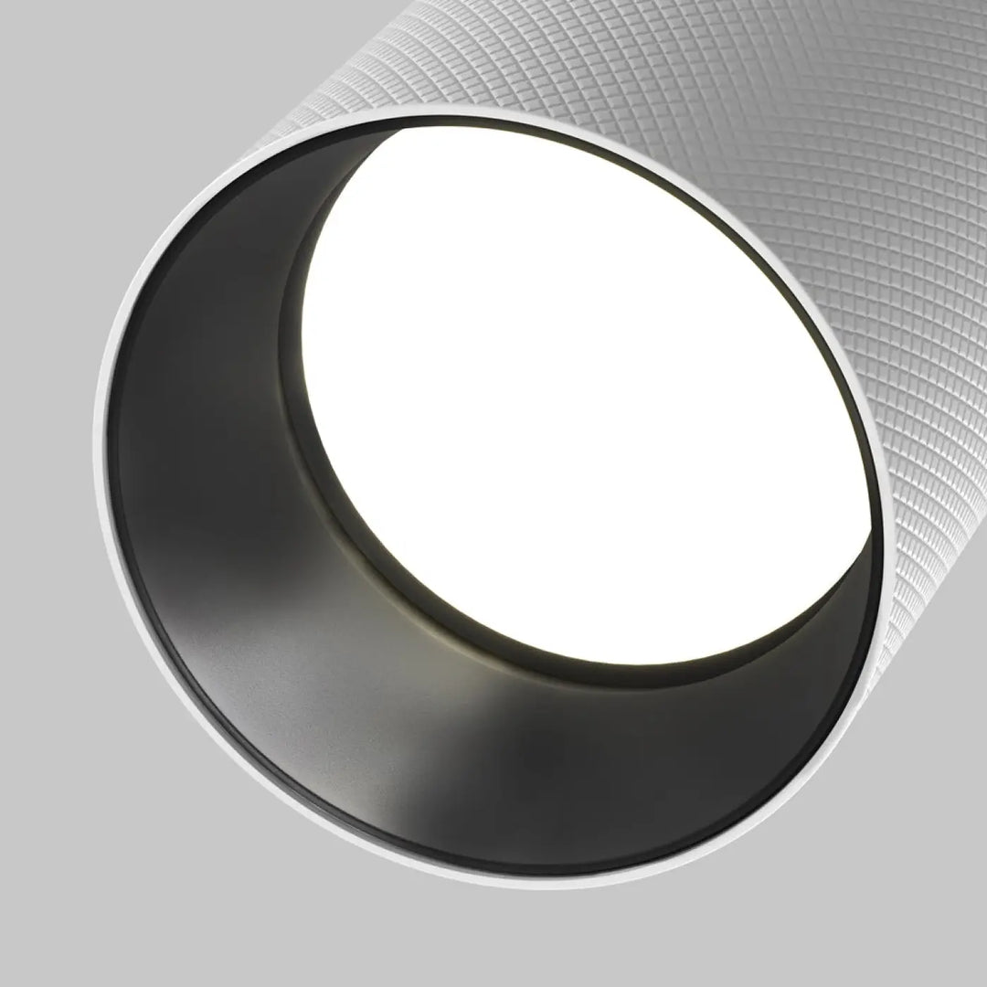 Spot orientable led blanc cylindrique en aluminium texturé avec tête orientable et intérieur noir pour usage intérieur