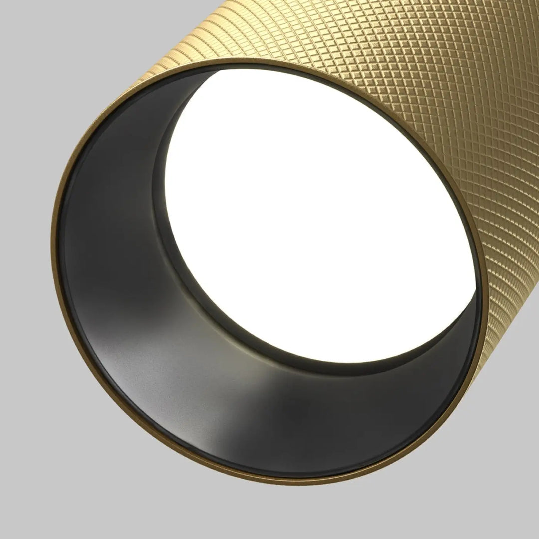 Spot orientable en aluminium texturé doré avec finition diamantée et tête orientable noir intérieur