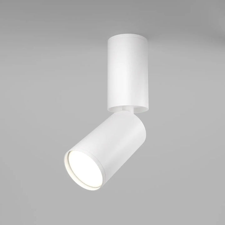 Spot orientable blanc en tige fine avec tête cylindrique au design moderne pour éclairage sur rail