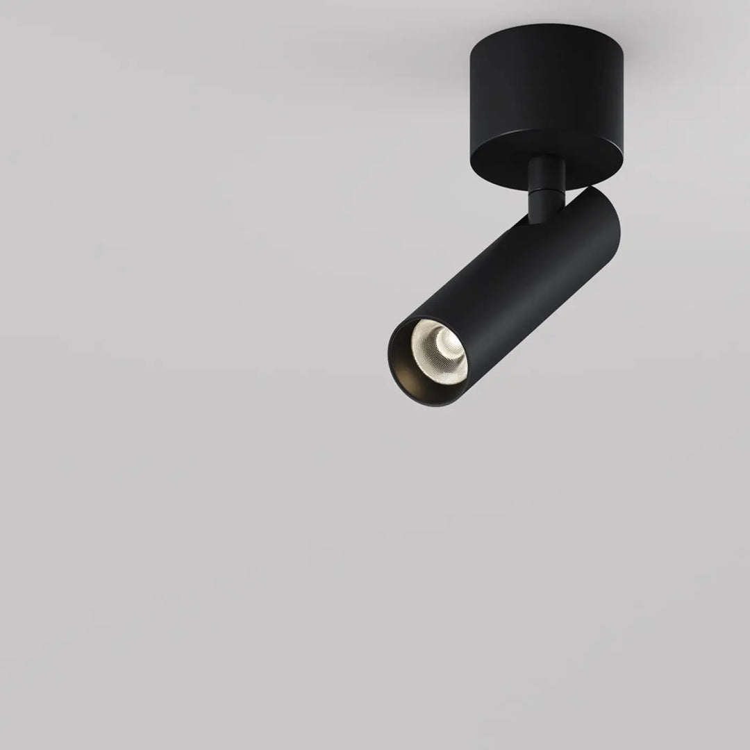 Spot focus t led tube ultra-fin en noir mat avec base ronde et tête ajustable pour éclairage sur rail moderne