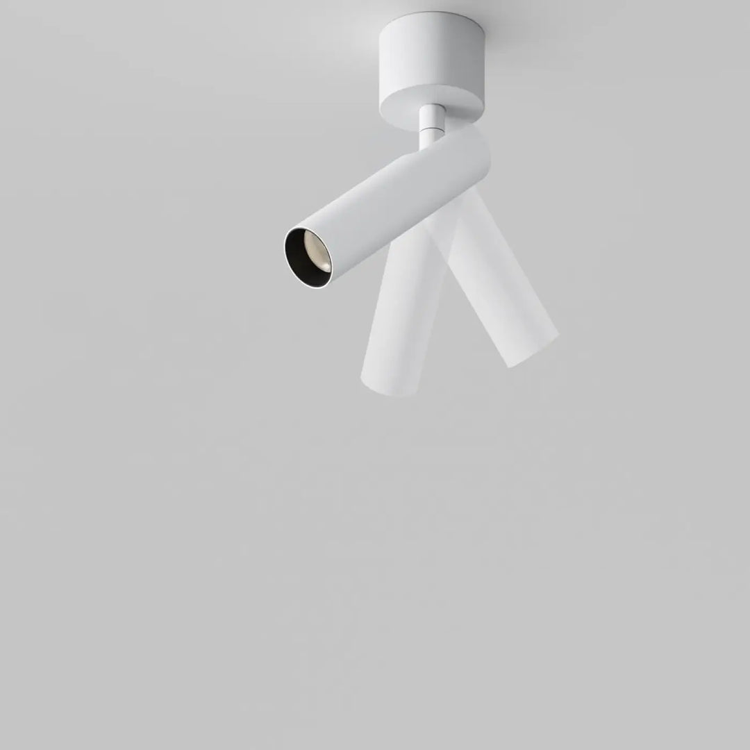 Projecteur blanc cylindrique spot focus t led avec bras ajustables en design ultra-fin tube base ronde minimaliste