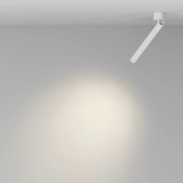 Spot focus t led tube ultra-fin blanc cylindrique avec base ronde au design minimaliste et élégant