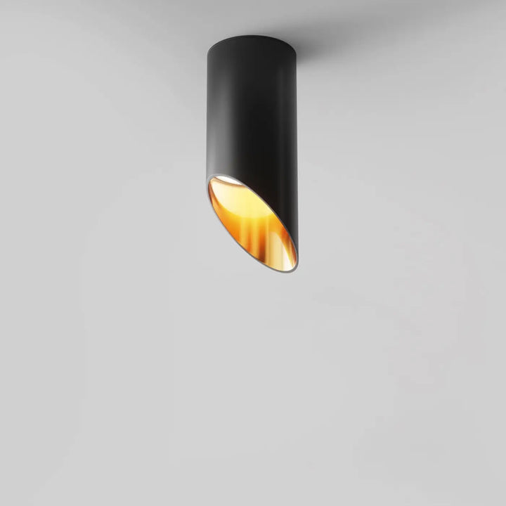 Spot lipari long cylindre en acier noir avec intérieur doré pour éclairage encastré plafond design