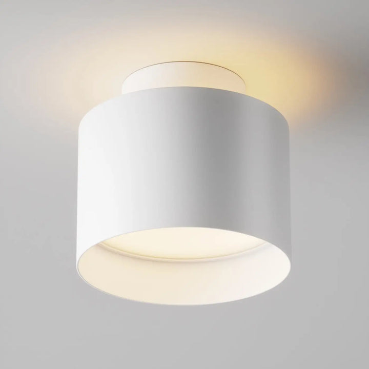 Spot | planet large cylindre plafond led blanc avec éclairage ambiant doux en acier noir et design moderne saillie planet led