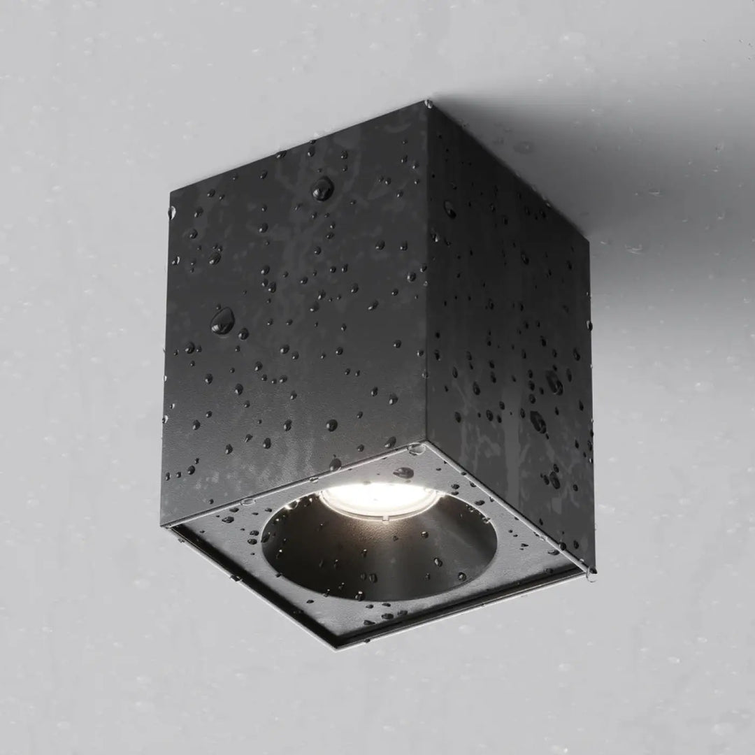 Spot zoom carré en saillie noir mat avec centre circulaire lumineux idéal pour éclairage moderne intérieur
