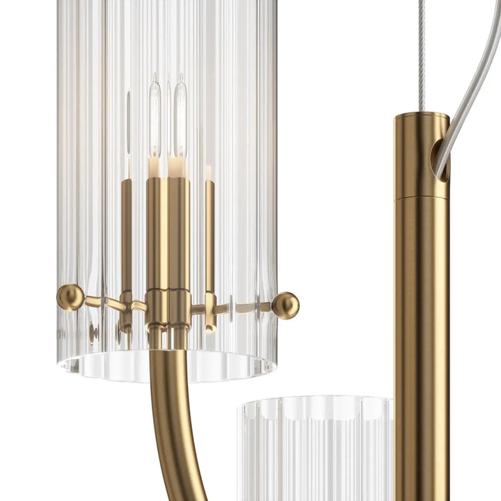 Suspension luminaire arco avec abat-jour en verre strié cylindrique et bras courbés finition laiton