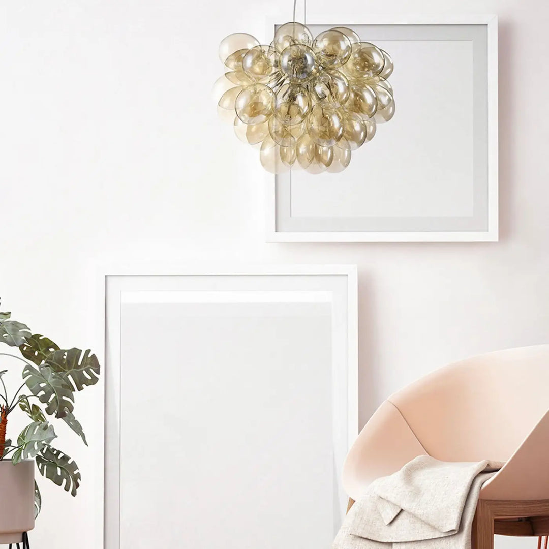 Suspension luminaire balbo en verre fumé couleur nickel composée d’orbites en verre ambre pour salle à manger