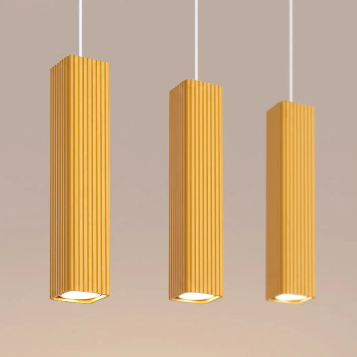 Suspension Rayo jaune en ligne à 3 tubes cannelés, détail des cannelures