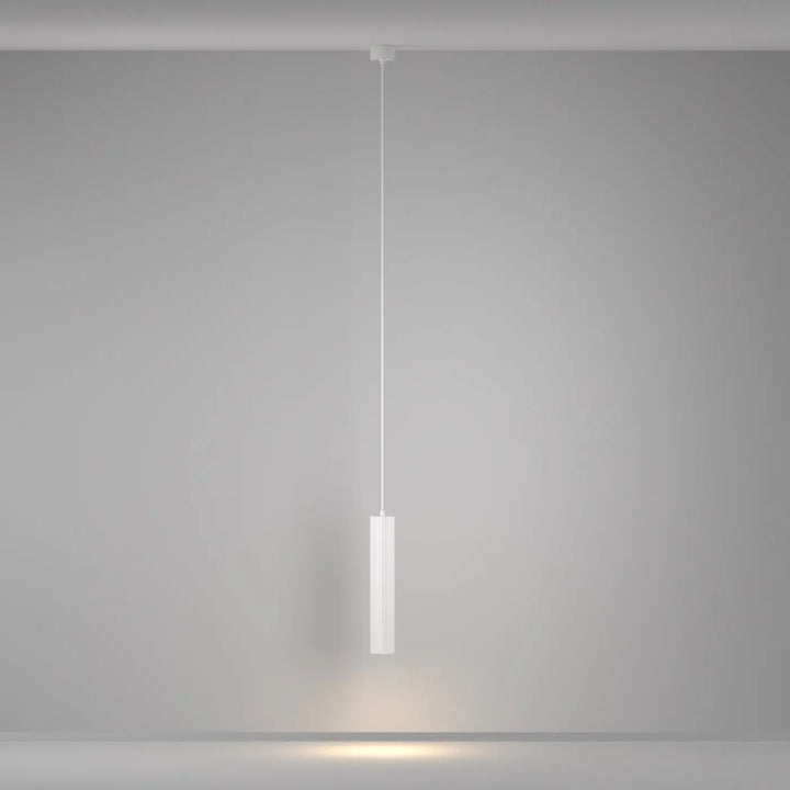 Suspension luminaire calipso tube blanc cylindrique minimaliste au-dessus d’un îlot avec design moderne élégant