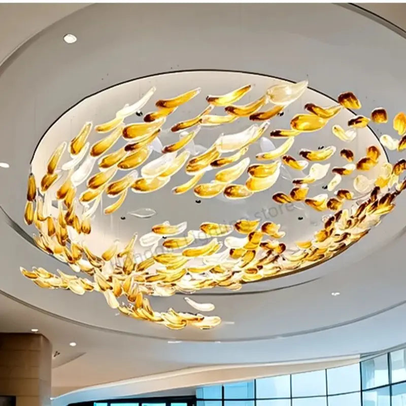 Suspension Cascade Cristal Doré Feuilles Sculpturales Moderne Chic