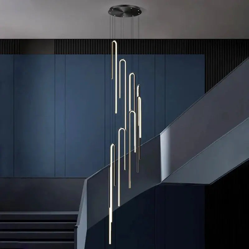 Suspension Cascade Cylindres Dorés Haut Plafond Moderne