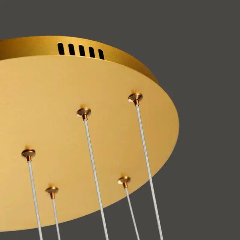 Suspension Cascade Dorée à Disques Cristal Design Luxueux

