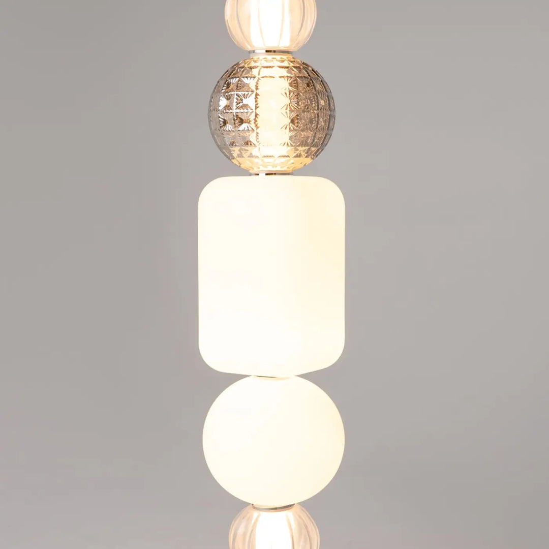 Suspension collar métal doré avec cinq diffuseurs ronds en verre blanc givré, clair et argent gravé moderne