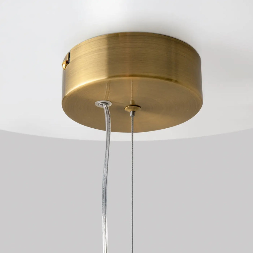 Suspension collar en métal doré avec finition brossée et lumière à 360° suspendue par deux cordons