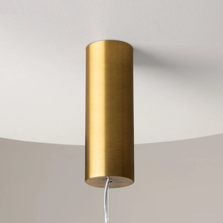 Suspension luminaire cosmo linéaire en laiton cylindrique avec led linéaire et verre transparent minimaliste