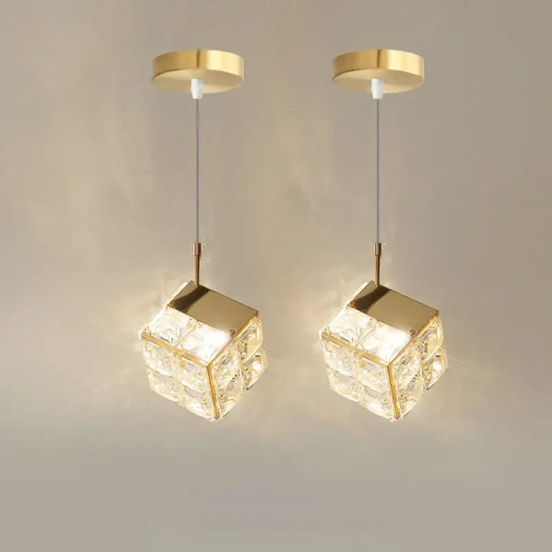 Suspension Cristal Cube Transparent Et Structure Dorée Moderne