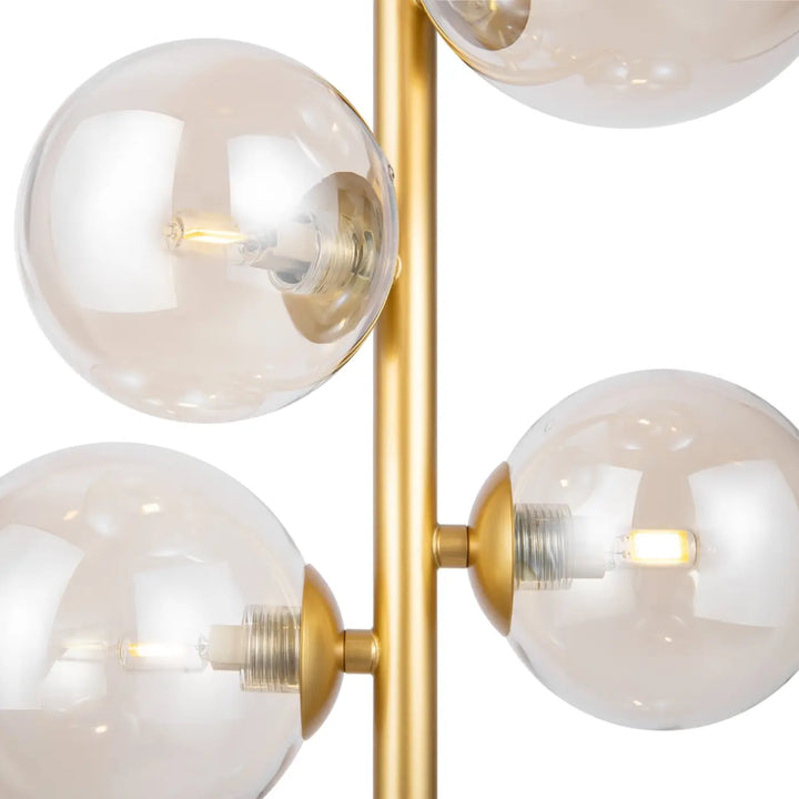 Lampadaire moderne doré dallas compacte avec quatre globes en verre et ampoules led chaudes suspension dallas