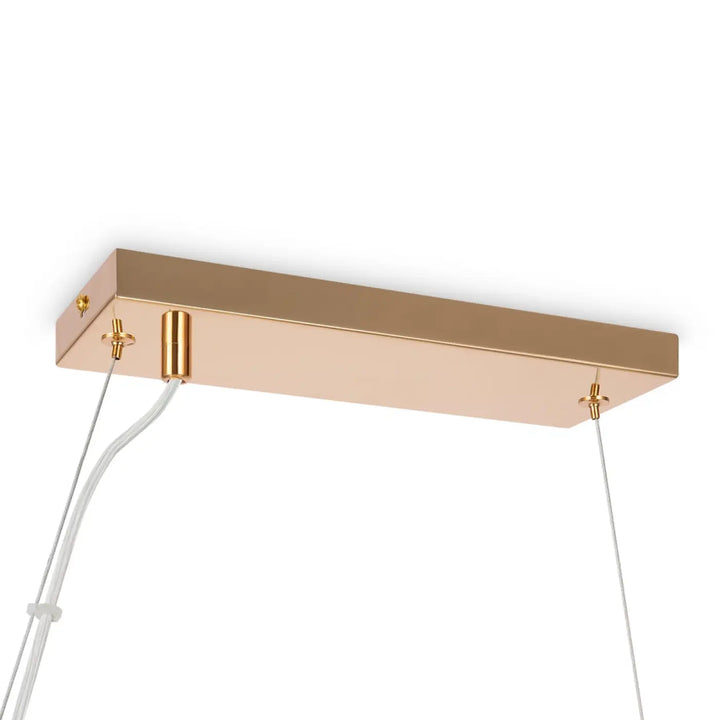 Suspension linéaire dallas linéaire en finition rose gold brossé avec câble transparent style art déco