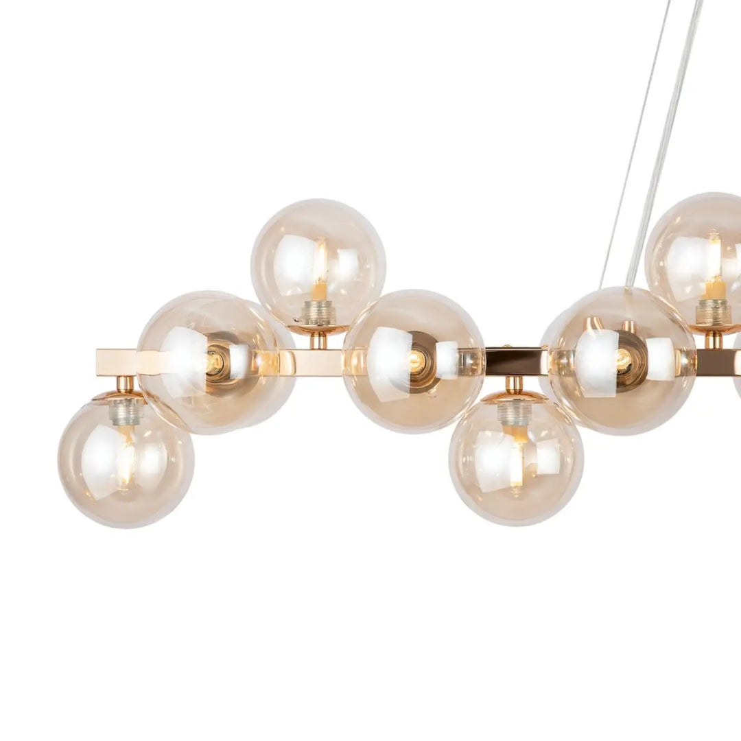 Suspension linéaire dallas linéaire art déco en laiton moderne avec globes en verre ambré pour éclairage décoratif