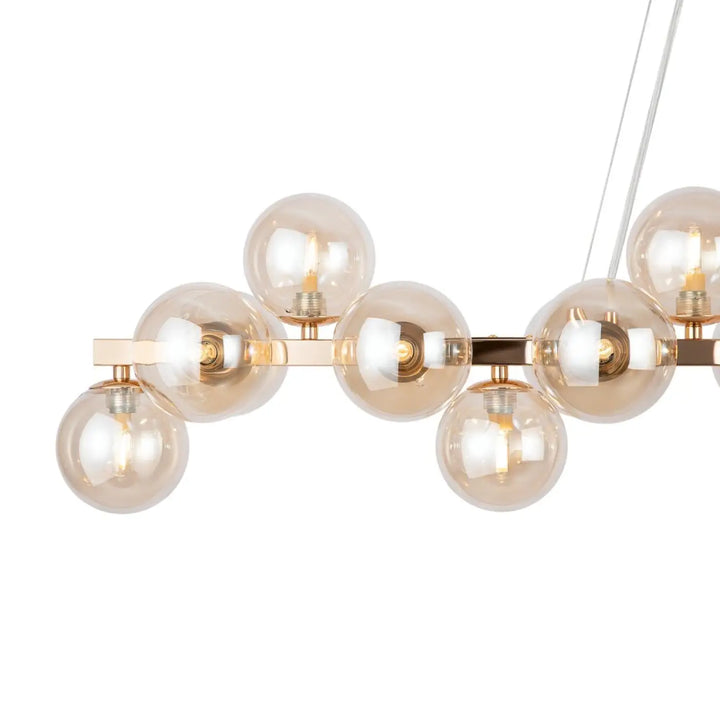 Suspension linéaire dallas linéaire art déco en laiton moderne avec globes en verre ambré pour éclairage décoratif