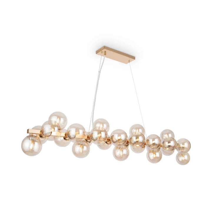 Suspension linéaire dallas linéaire art déco en métal doré avec plusieurs globes en verre ambre pour plafond