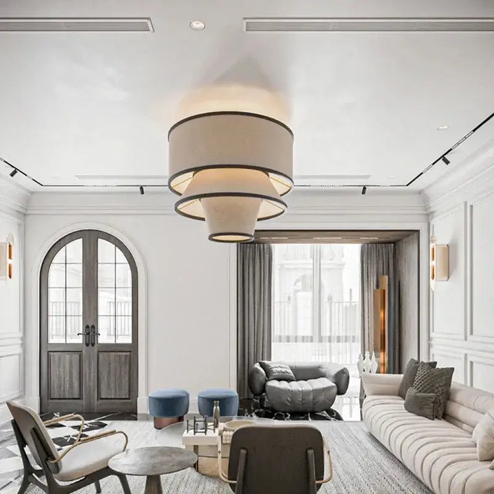 Suspension design conique en tissu beige et cerclages noirs

