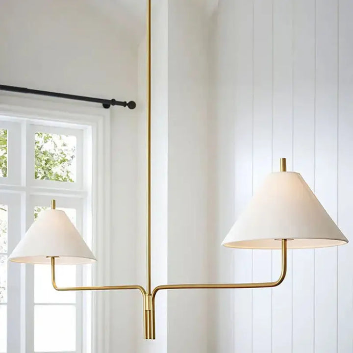 Suspension design dorée à deux bras avec abat jour beige