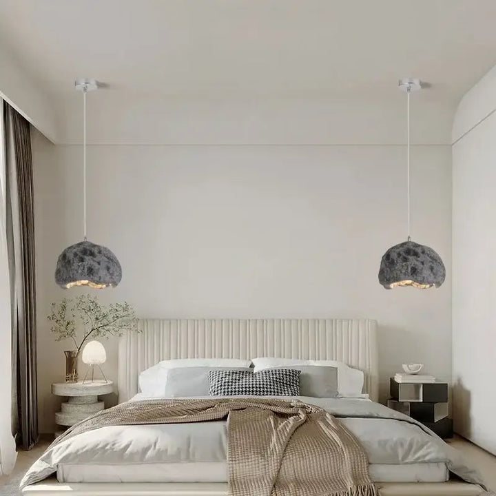 Suspension design effet roche brute lumière chaleureuse

