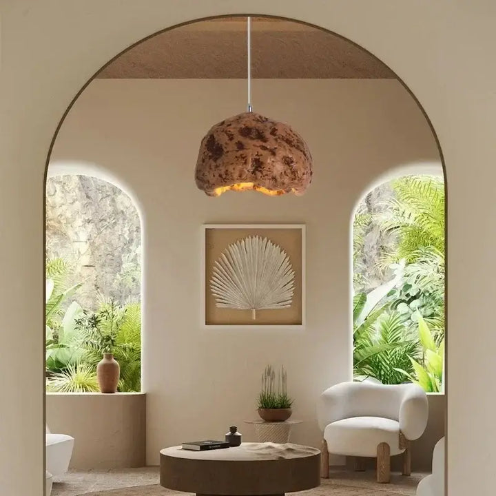 Suspension design effet roche brute lumière chaleureuse


