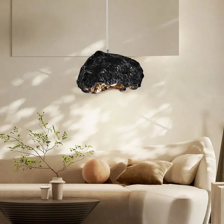 Suspension design effet roche brute lumière chaleureuse

