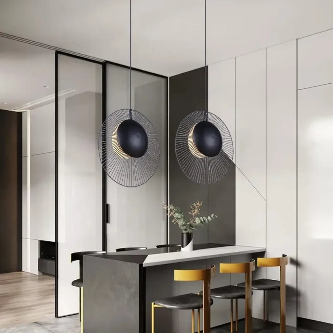 Modern black suspension design with a circular perforated lampshade ...