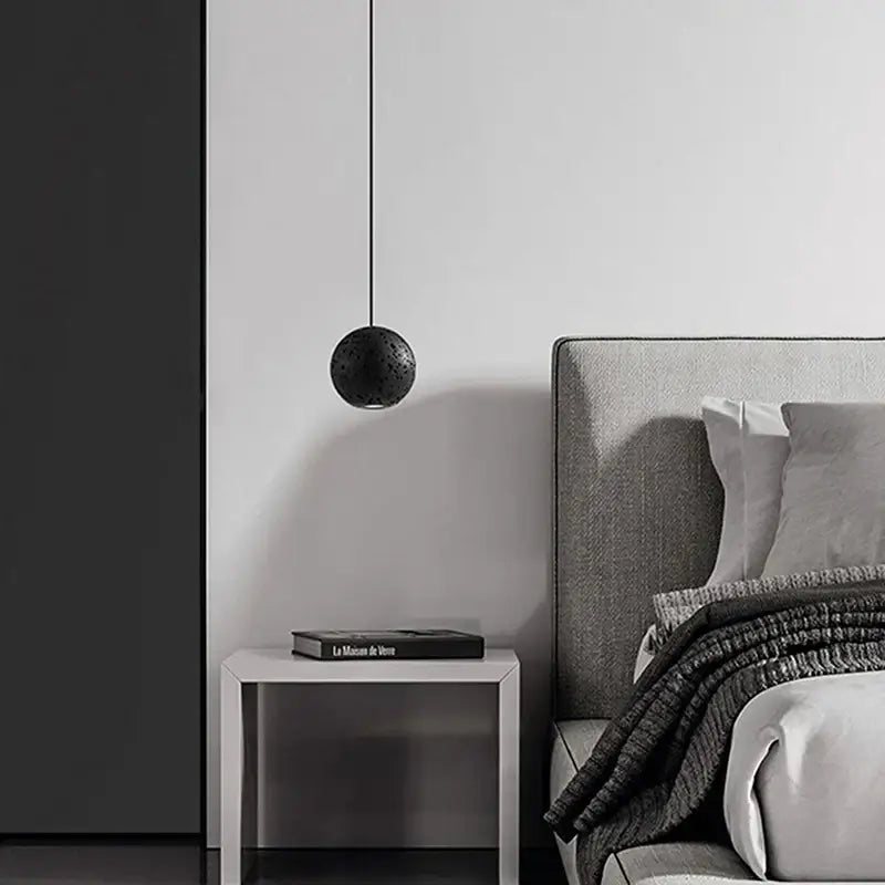 Suspension design sphère moderne éclairage noir chic