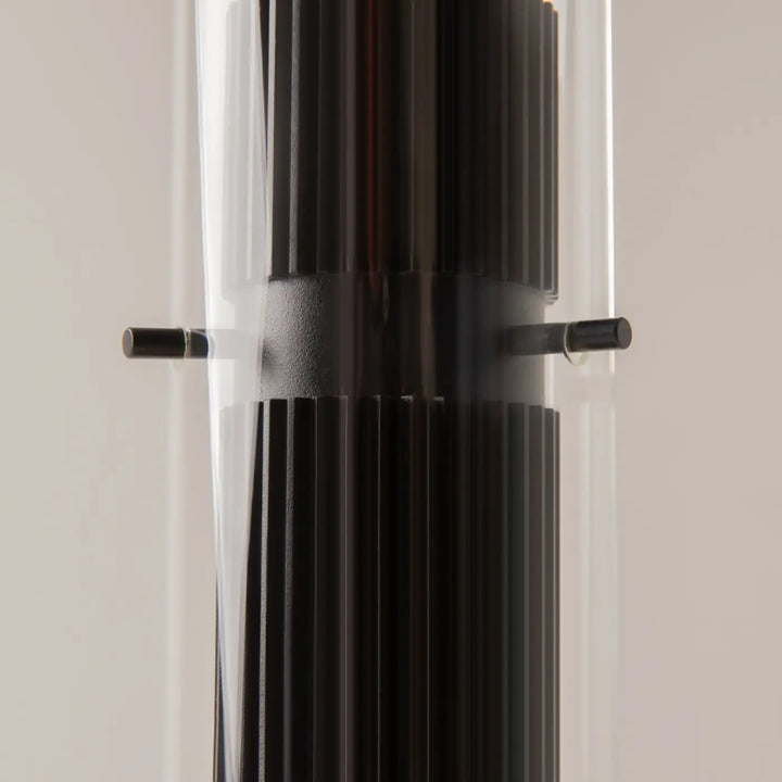 Suspension luminaire dynamics cylindre strié en verre noir côtelé au design moderne pour îlot lumineux