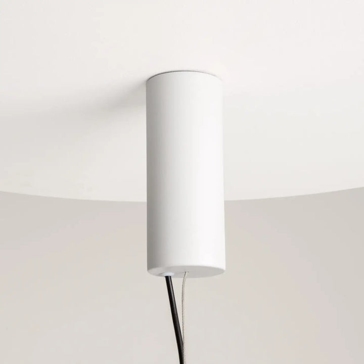 Suspension enigma cylindre led blanche cylindrique plafond avec orientation réglable et design minimaliste