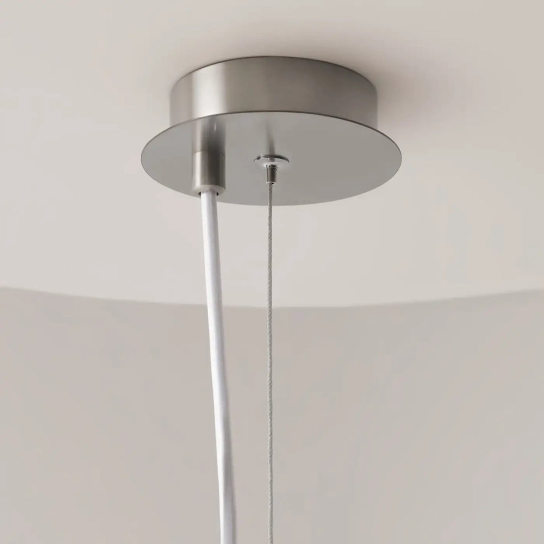 Suspension luminaire erich globe avec base circulaire en acier inoxydable brossé et câble blanc pour lumière douce art déco