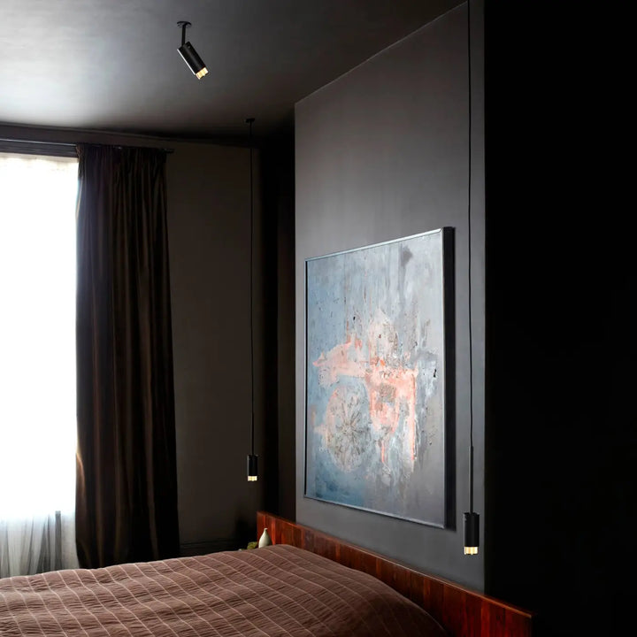Luminaire Exhaust graphite finition laiton dans un intérieur #couleur_dor