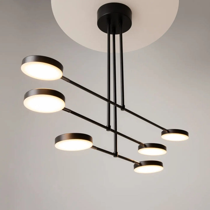 Suspension luminaire fad métal noir avec bras articulés et six leds circulaires chaudes en motif géométrique moderne