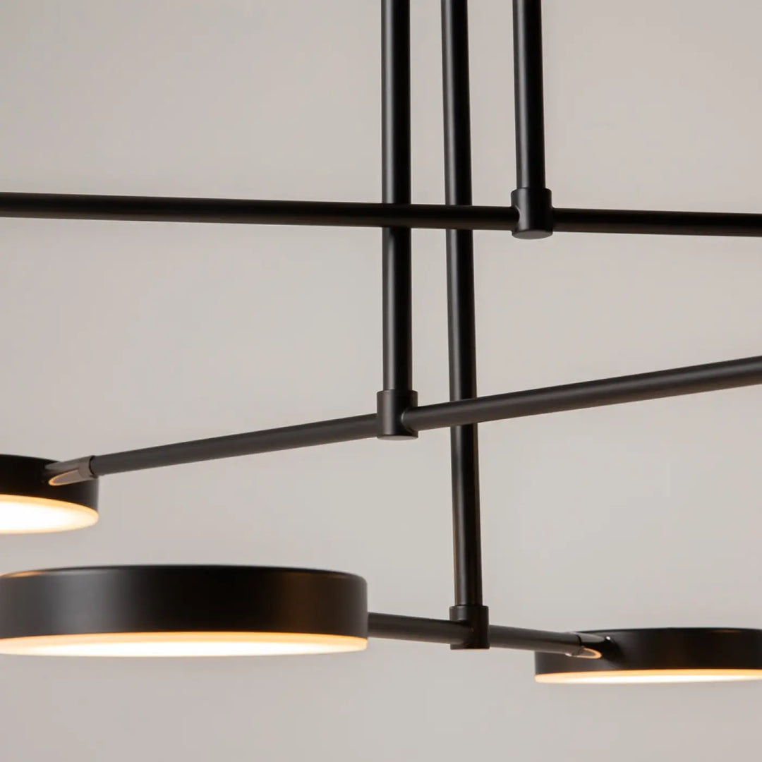 Suspension fad bras articulés en métal noir avec finition mate et luminaires circulaires pour éclairage élégant
