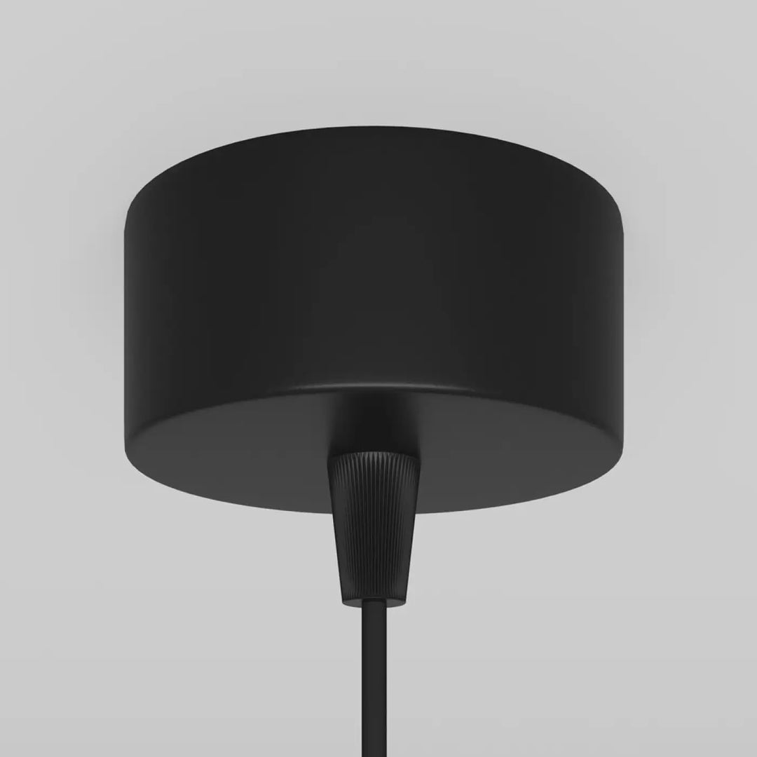 Suspension luminaire focus cylindre noir mat avec connecteur central cannelé pour éclairage au-dessus d’un îlot tube fin