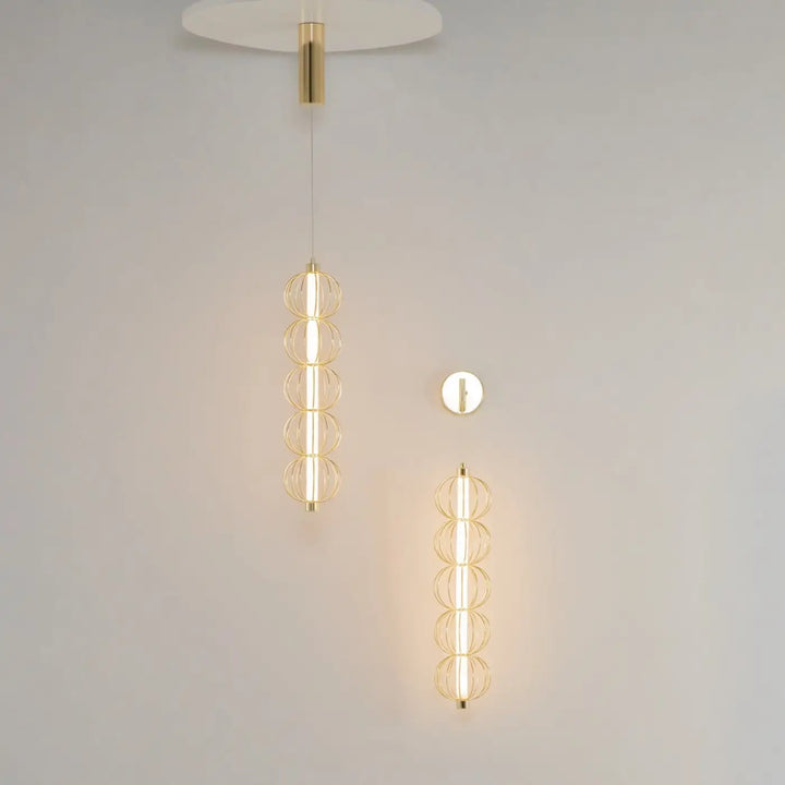 Luminaire suspension golden cage tube vertical avec pendentif et applique murale dorés à structure circulaire en fil métallique