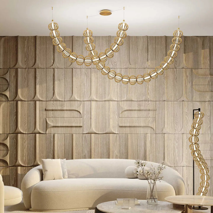Suspension luminaire golden cage xxl sphérique dorée avec design moderne et sculptural en métal