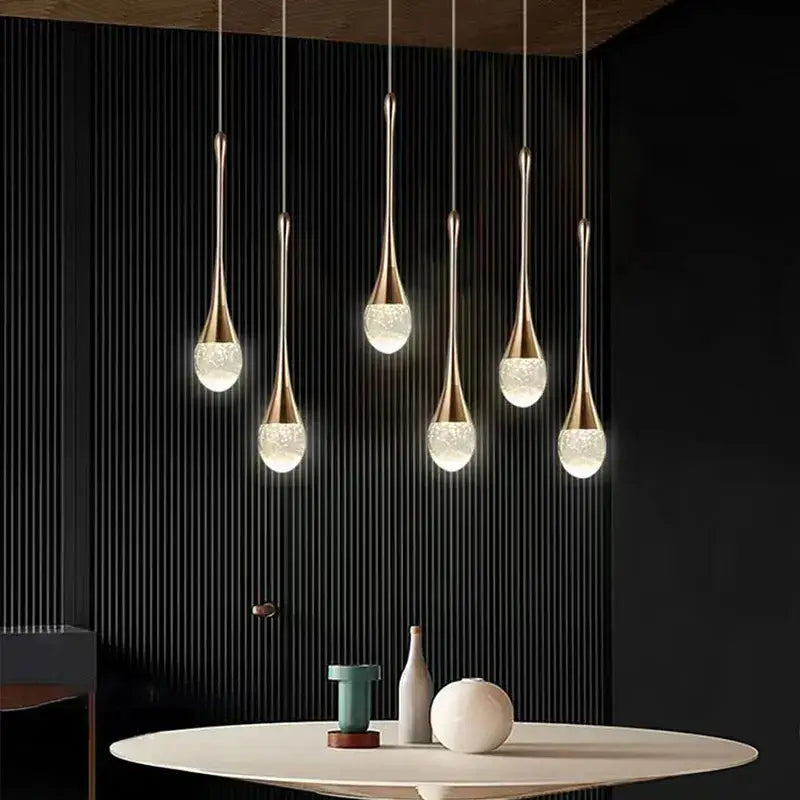 Suspension goutte dorée élégante en version 1, 2 ou 3 lampes