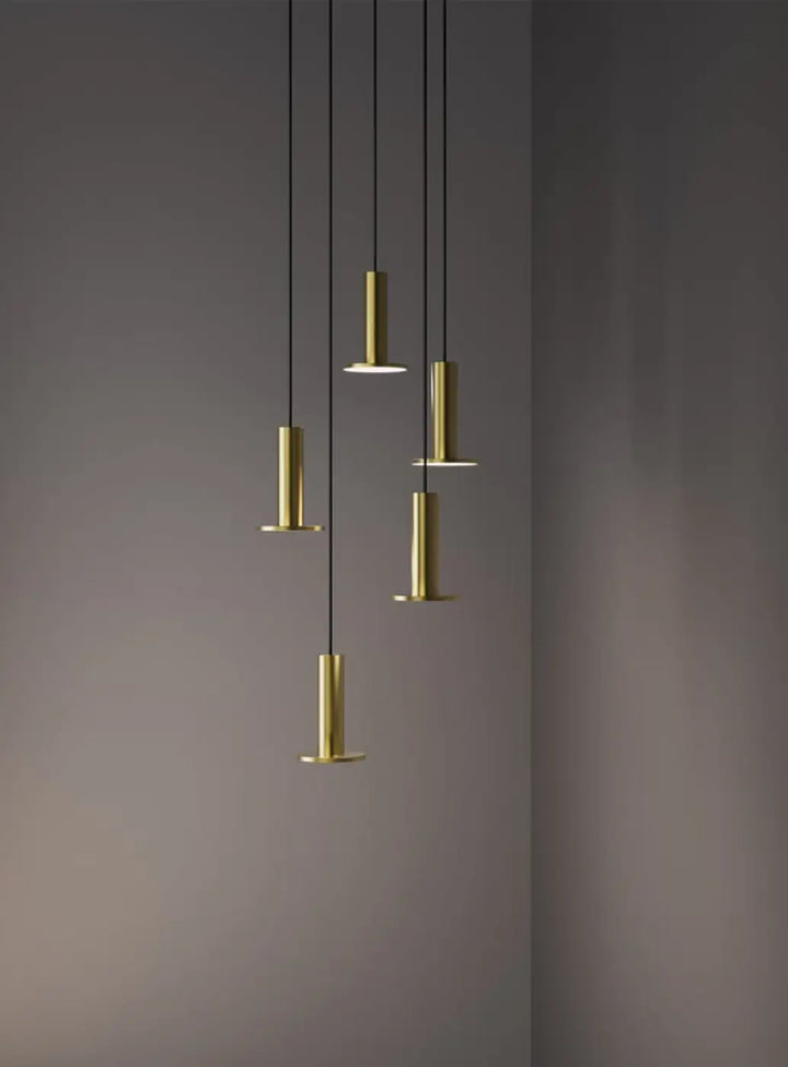 Suspension Cielo Plus Chandelier dorée à 5 suspensions dans un intérieur