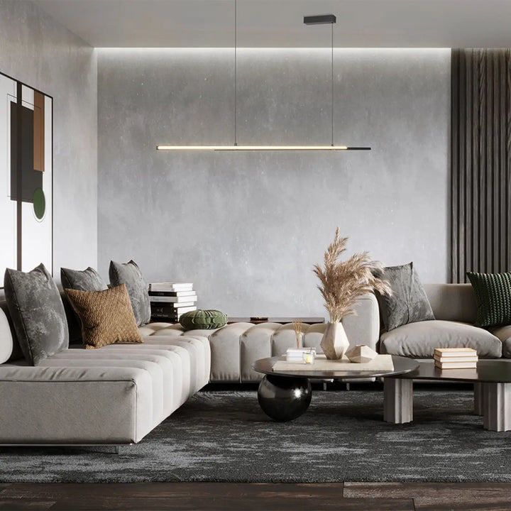 Table basse moderne minimaliste avec plateau rond en verre et pieds effet béton dans suspension halo blanc chaud diffusion latérale
