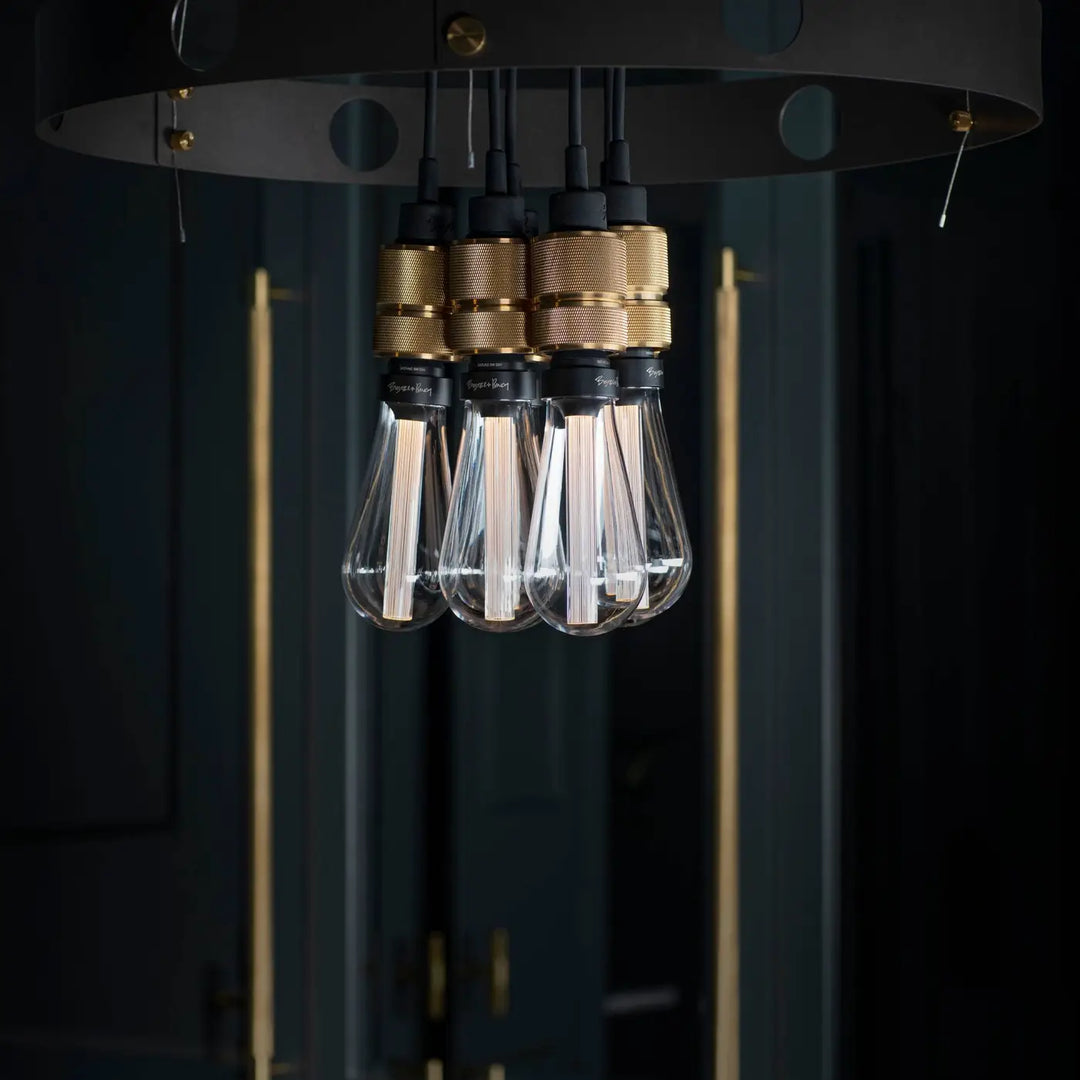 Suspension Hero Light dans un intérieur #couleur_dor