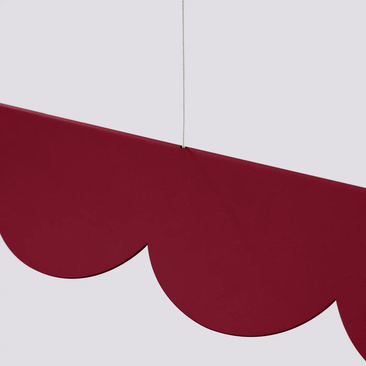 Suspension BISCUIT bordeaux allumée, bandeau LED