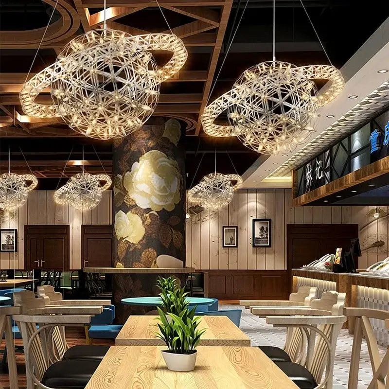 Suspension LED sphère dorée design galaxie style contemporain

