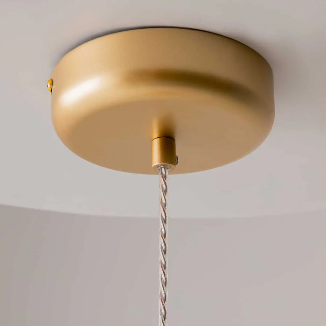 Suspension led spirito globe en métal doré avec lumière douce et cordon métallique torsadé en trois teintes