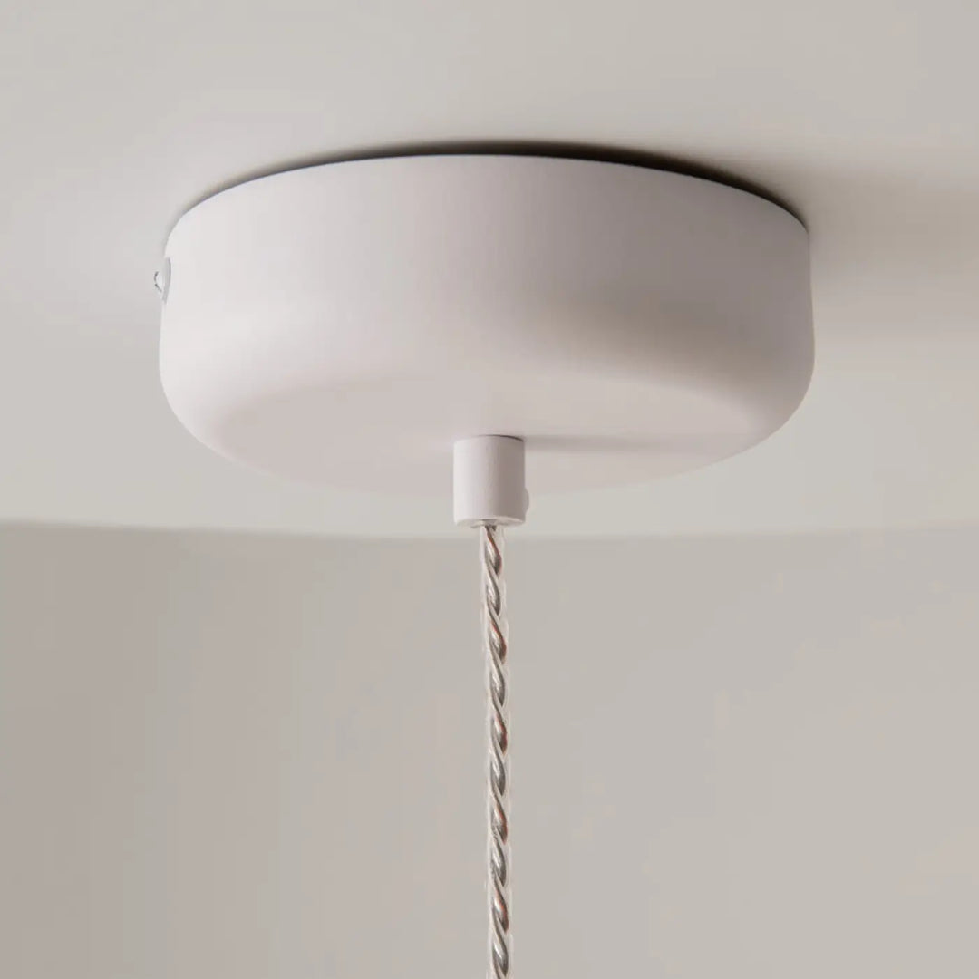 Suspension led spirito blanc mat avec cordon métallique torsadé pour une lumière douce en trois teintes