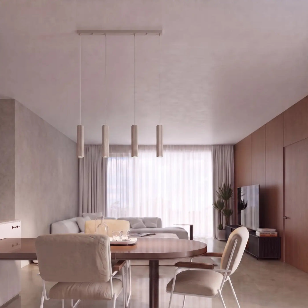 Suspension Karbon taupe en ligne à cylindres nervurés dans un intérieur contemporain